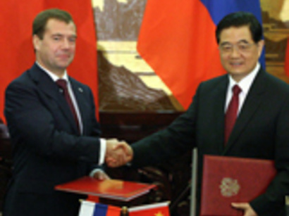عکس: روسیه و چین قصد گسترش همکاری های استراتژیکی خود را دارند / روسیه